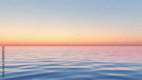 Fototapeta Naklejka Na Ścianę i Meble -  Serene pastel sunset over a calm water surface.