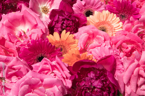 close up of pink and orange chrysanthemum, rose and germini flowers photo