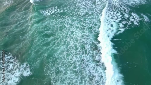 op Down View Of Ocean Waves Crashing On Shoreline