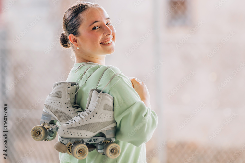 portrait of smiling young girl or woman with roller skates