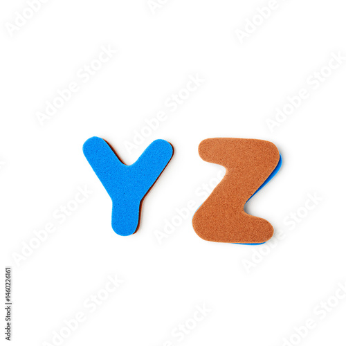 Colorful foam letters Y Z alphabet isolated on white background. Clipping path.