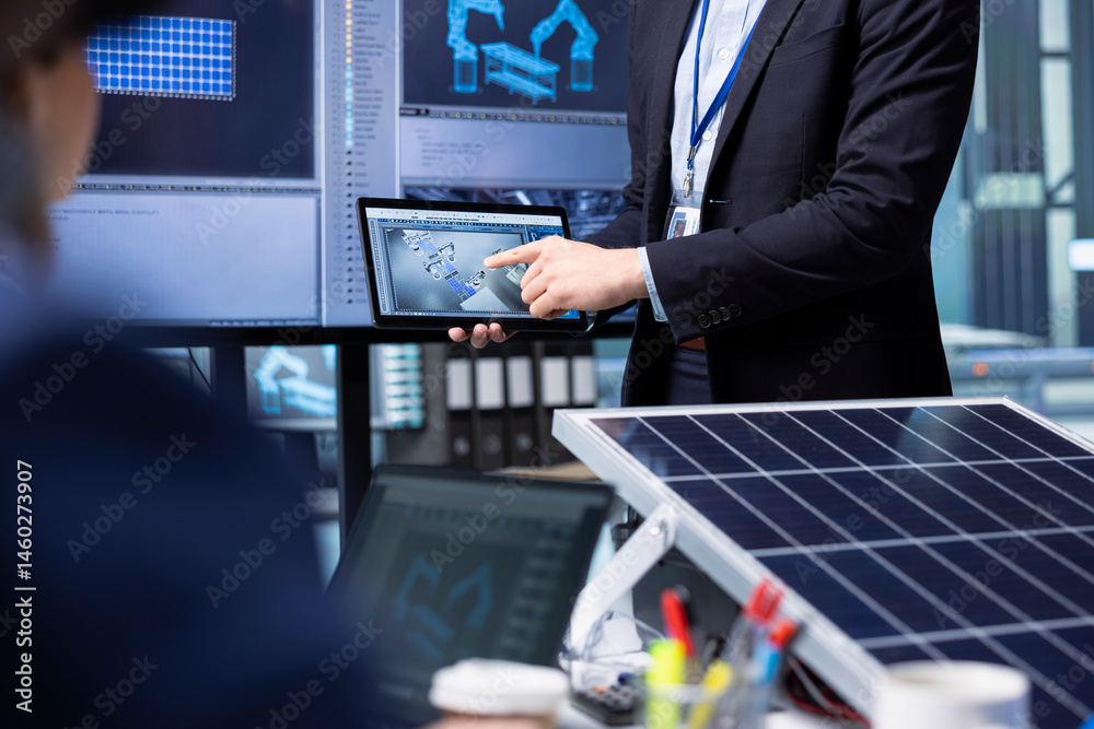 Investors examine solar panel surface using tablet, discussing design efficiency in factory office. Businessmen holding device meeting to chat about technical improvements to solar cells, closeup