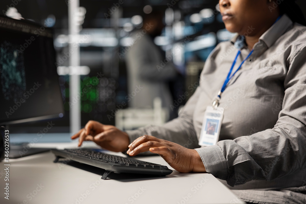 Close up of data center programmer coding, writing script on PC identifying bottlenecks. Server farm IT specialist typing on compute keyboard, troubleshooting computer bugs, implementing optimizations