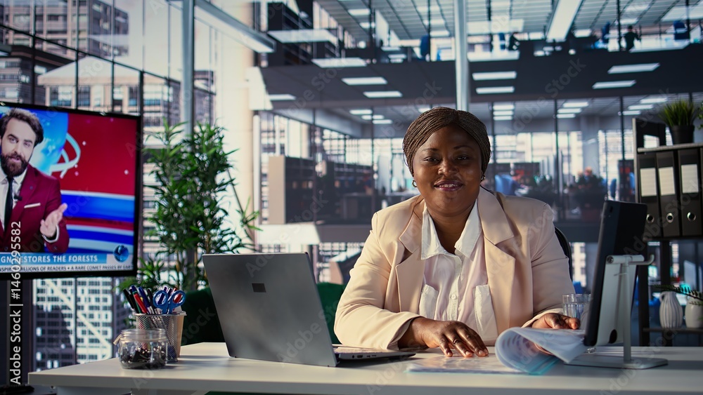 Ambitious female leader focusing on strategic planning and business success, setting a clear vision and objectives for the enterprise. Black director achieving organizational growth. Camera B.