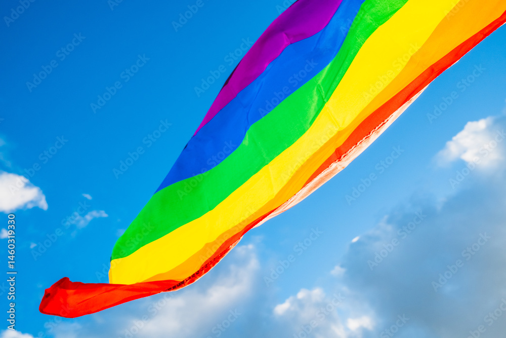 LGBTQ Rainbow Flag on blue sky
