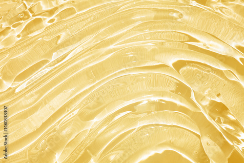 Cream gel yellow orange retinol or vitamin c transparent cosmetic sample texture with bubbles background