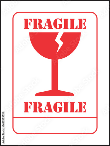 A red wine glass icon with a crack and the word "FRAGILE" above and below, warning of delicate contents