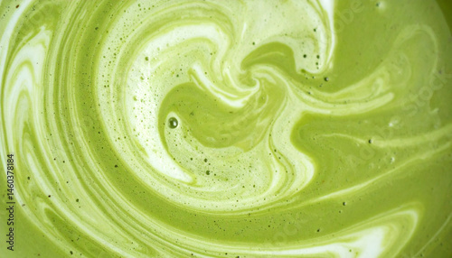 Green tea matcha mixing with milk texture background Food and drink close up