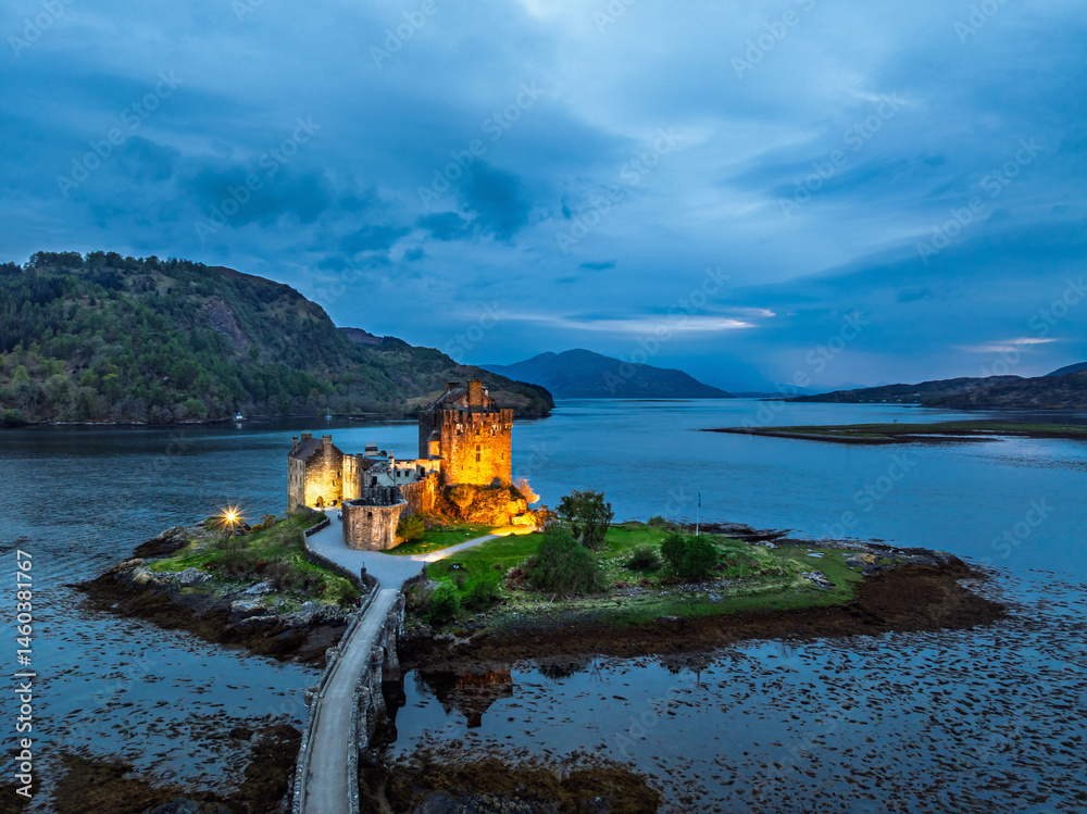 Night over Eilean Donan Castle and Loch Duich from a drone, Isle of Skye, Highlands, Scotland, England