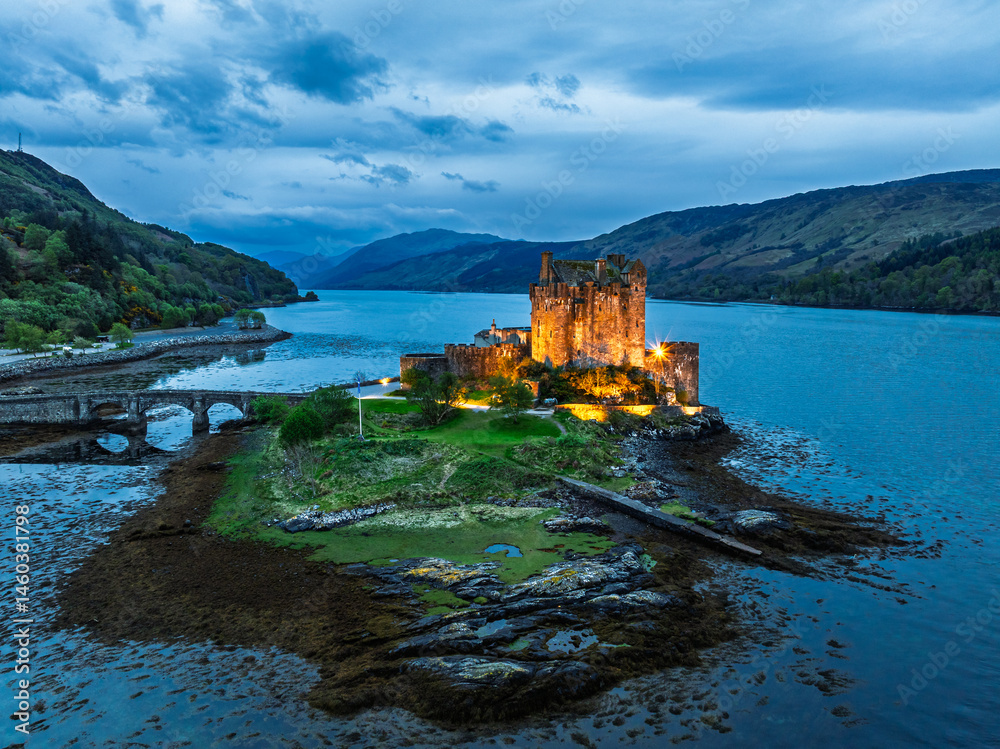 Night over Eilean Donan Castle and Loch Duich from a drone, Isle of Skye, Highlands, Scotland, England