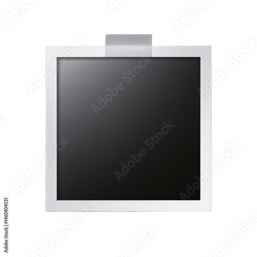 Close-up of a classic white Polaroid instant photo against a neutral surface