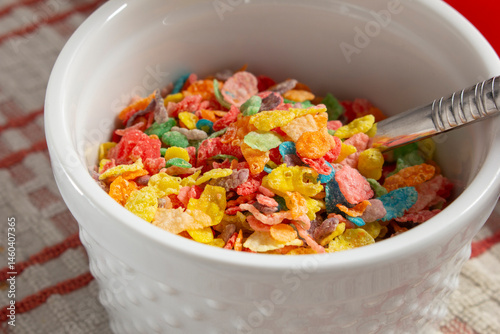 фотографія A view of a bowl of popular rainbow flakes cereal.