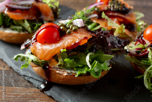A closeup view of some lox bagels.