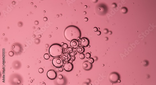 Ethereal Blush Pink Liquid with Translucent Bubbles in Macro View Against Softly Blurred Backdrop