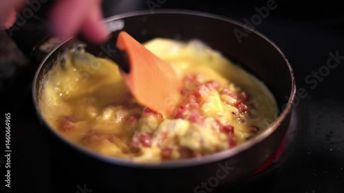 Scrambling Eggs And Ham In Pan