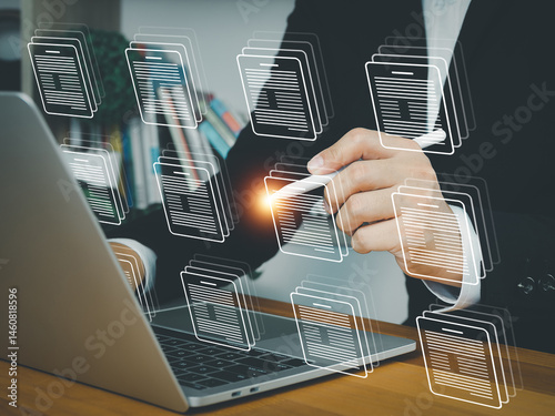 Businessman digital document management on laptop with holographic interface. Sorting or managing files. Organizing digital organization data storage documents in online database.