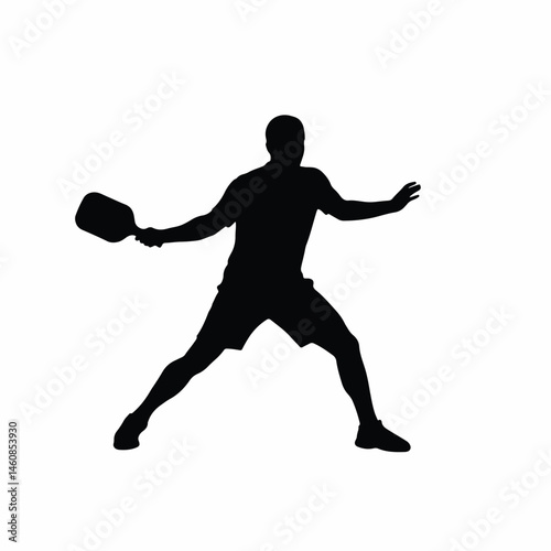 Silhouette of a Pickleball Player Ready To Serve With Paddle
