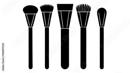Isolated on white, a set of black makeup brushes, essential beauty tools for applying color