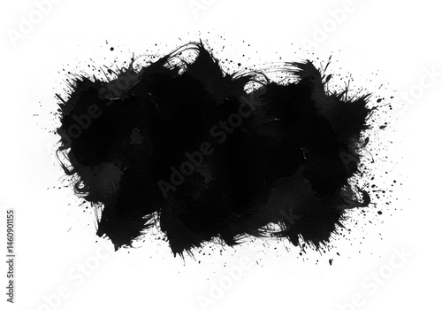 Black ink stain on white background.
