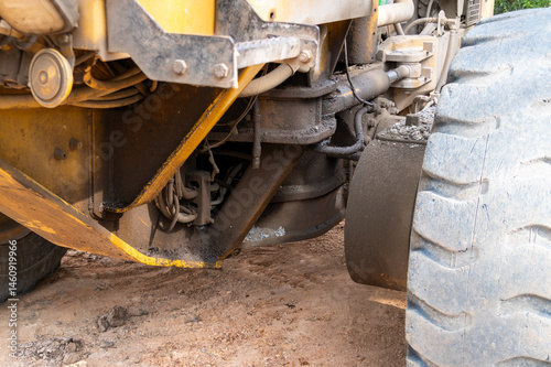 Heavy machinery action maintenance focus in outdoor construction environments