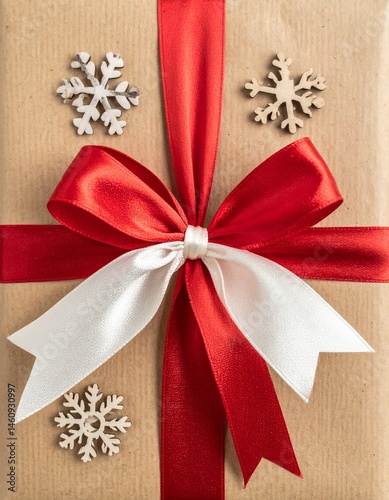 Elegance and detail of holiday gifting. The focus is tight on the carefully knotted bow, with the ribbon’s texture clearly visible