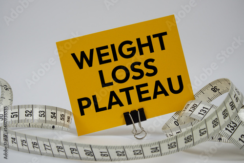Quadro em tela Weight Loss Plateau text with measure tape on white background