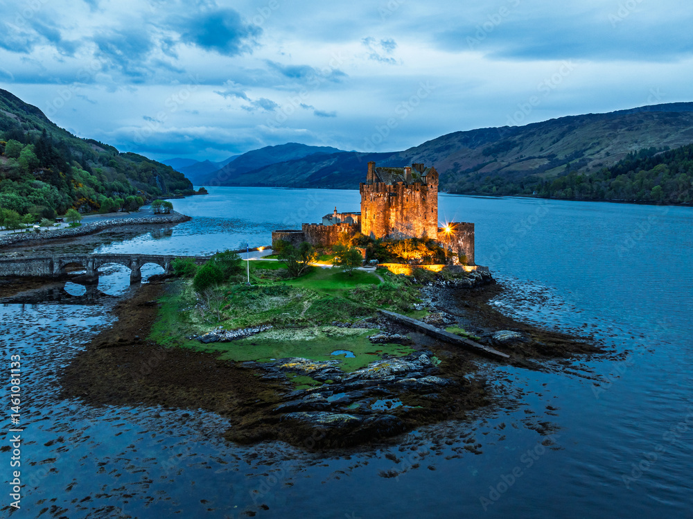 Night over Eilean Donan Castle and Loch Duich from a drone, Isle of Skye, Highlands, Scotland, England