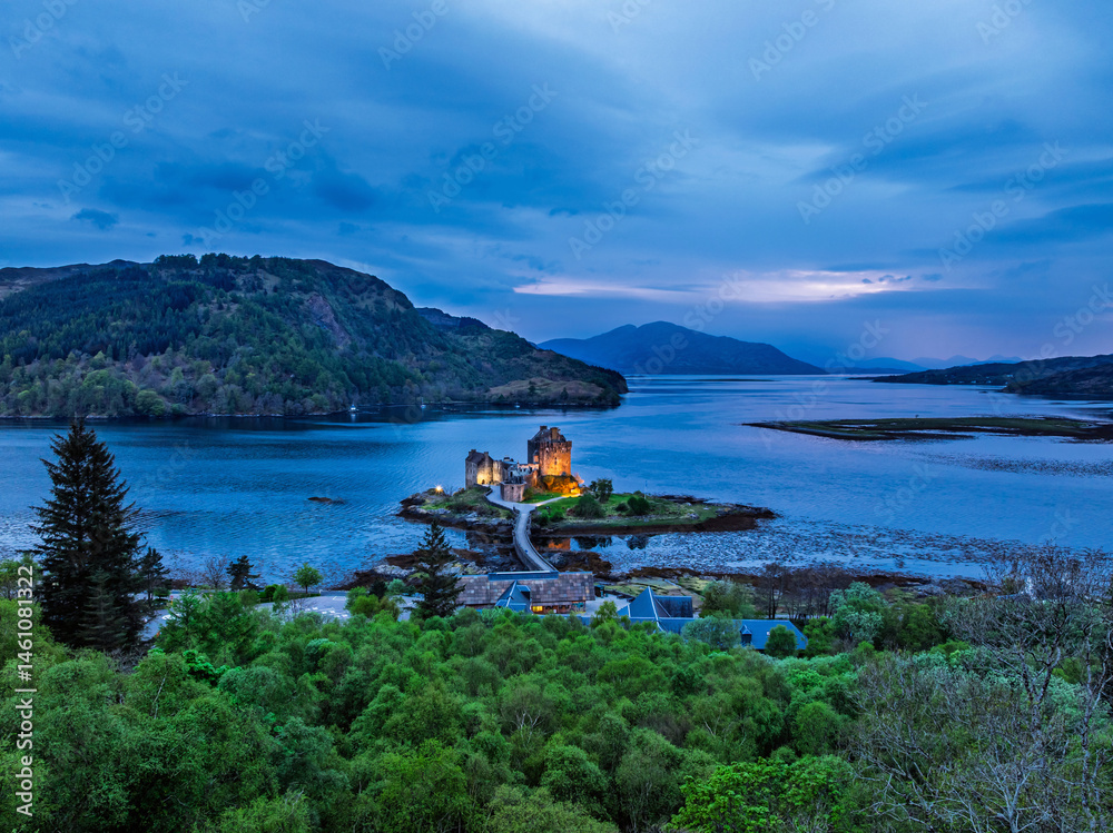 Night over Eilean Donan Castle and Loch Duich from a drone, Isle of Skye, Highlands, Scotland, England