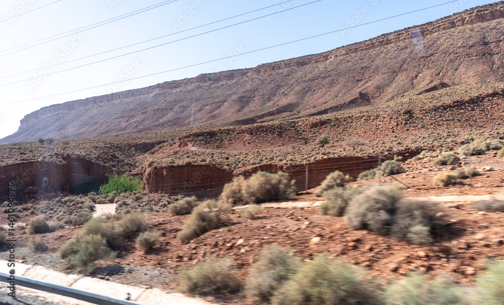 Morocco semi-deserts and mountains, north africa nature, Moroccan stone desert, red hills, villages and argan trees