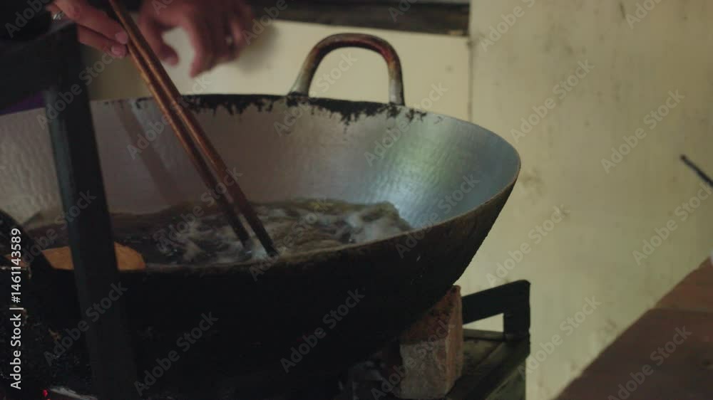 The process of making and frying cakue in Bandung Indonesia The process of making and frying cakue in Bandung Indonesia