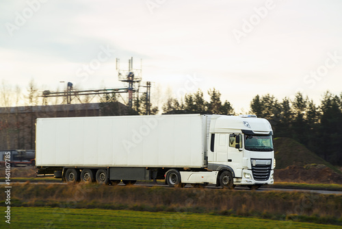 Commercial truck moving through countryside