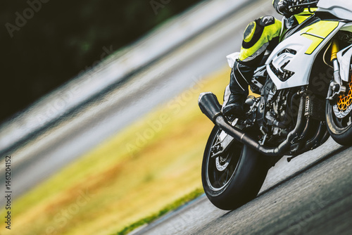Motorbike racing, rear wheel close up detail. Speed, circuit. Motorsport