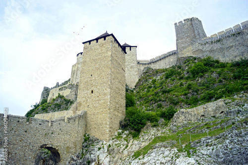Travel to the most famous sights of Serbia: a trip to the Golubac fortress on the Danube. The architecture of a medieval fortifications: a view of the defensive battlements and impregnable high towers