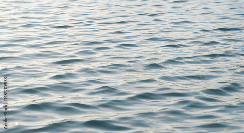 Rippling water surface serene and reflective