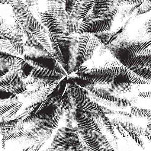 A textured black and white fabric displays a radial of intersecting lines.