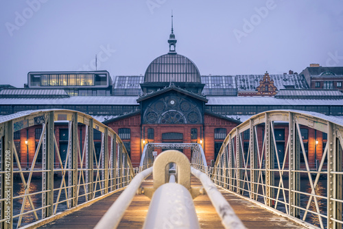Historic fishmarket building in Hamburg, Germany during winter evening