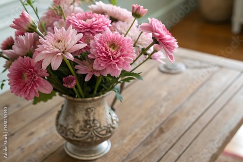 Wallpaper Mural A bunch of pink flowers in a vase on a wooden table offers natural floral beauty Torontodigital.ca