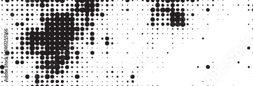 A grayscale portrait is constructed from numerous small scattered dots.