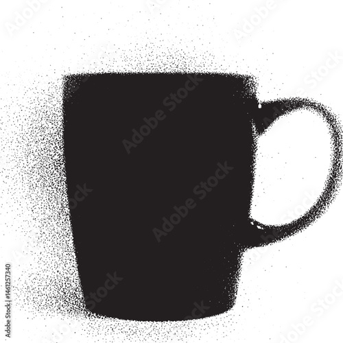 A dark ceramic mug rests on a white surface speckled with light.