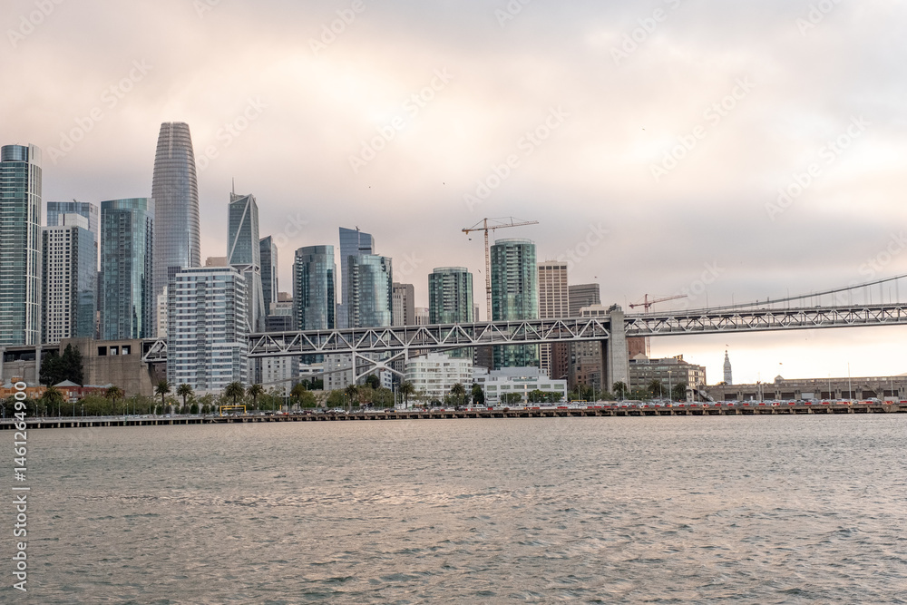 Obraz premium Lower perspective of San Francisco skyline showing Salesforce Tower and adjacent buildings rising above the bay – San Francisco, CA on May 11, 2019