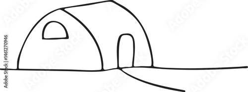 A simple rounded structure rests on a sandy surface.