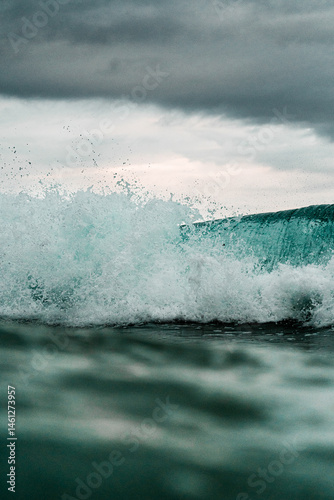 Olas rompiendo en día nublado, Playa de los Locos, Cantabria, Santander, Suances photo