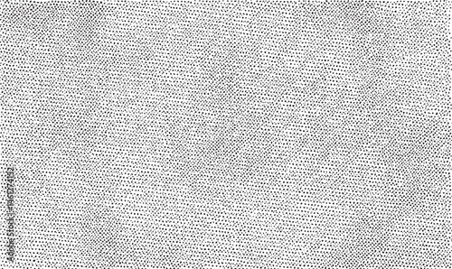 A dense repeating of small white dots covers the entire surface.