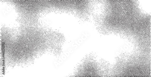 A textured white background features a dense scattering of small black dots.