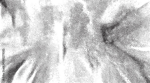 A grayscale portrait of a person's face appears through textured fabric.