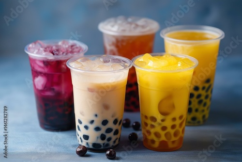 Obraz na płótnie A colorful array of refreshing bubble tea, showcasing vibrant flavors and textures in clear cups. w salonie