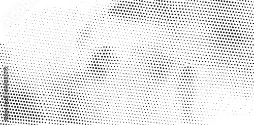 A grayscale eye emerges from a field of densely packed dots.