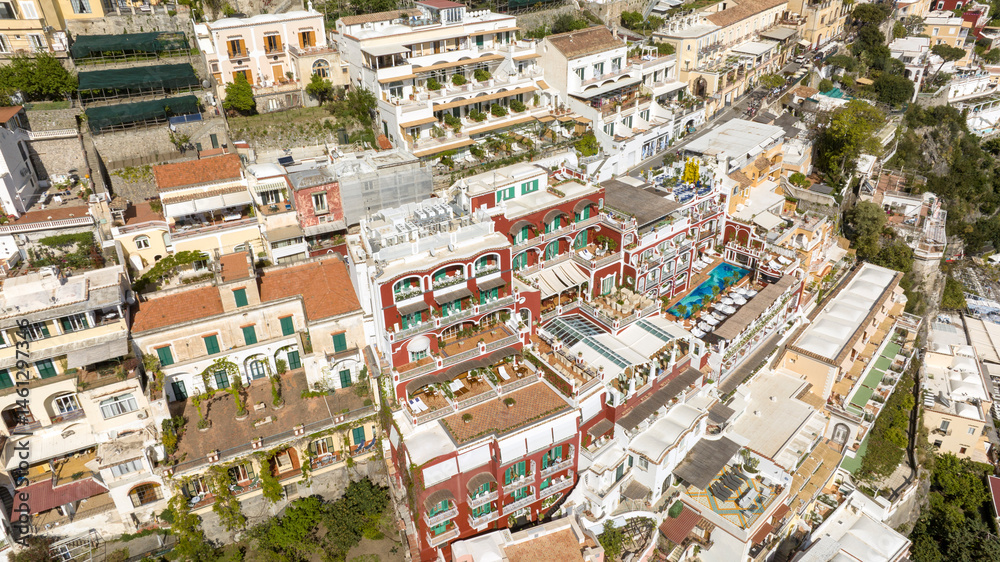 Aerial view of the characteristic colorful houses of Positano in the province of Salerno, Campania, Italy. They are built on a hill.