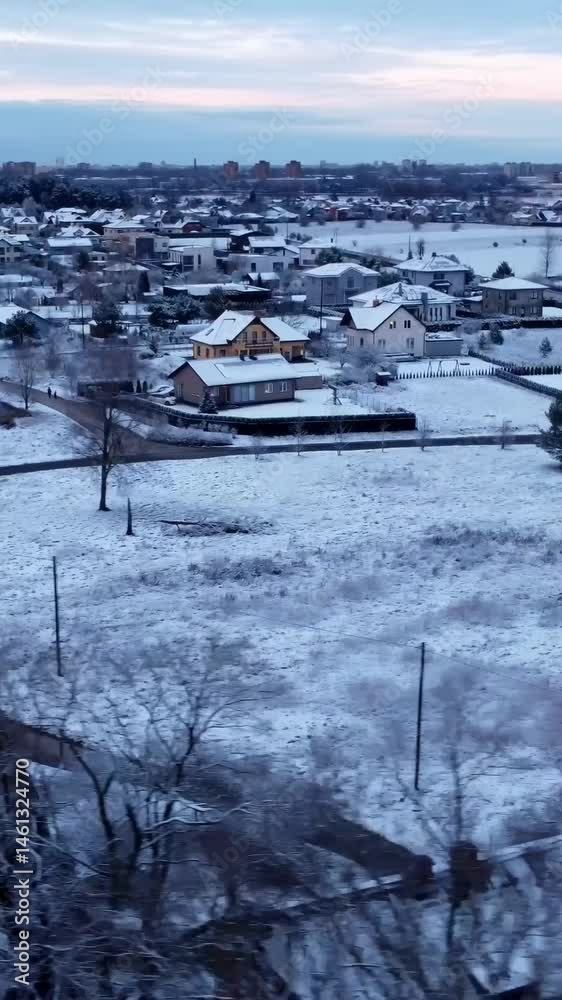 Aerial Establishing View of Snow-Covered Katlakalns, Riga Suburb in Latvia Aerial Establishing View of Snow-Covered Katlakalns, Riga Suburb in Latvia