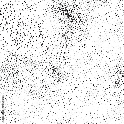 A dense scatter of small white dots covers a dark background.